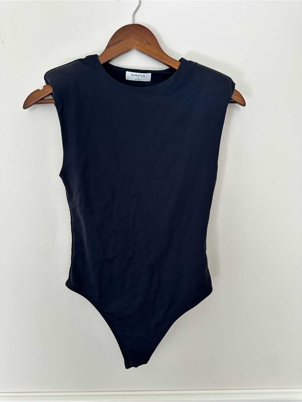Babaton Black Padded-Shoulder One-Piece Bodysuit